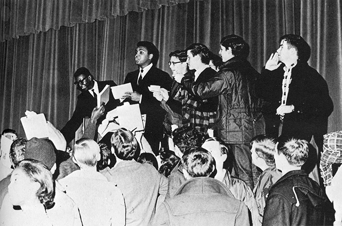 Muhammad Ali signs autographs at Atwood Hall in 1968