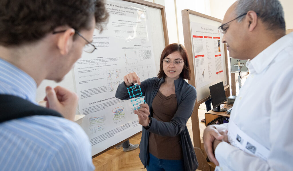 A student presents research during a previous showcase of undergraduate work.