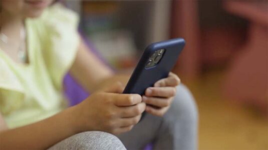 Young girl using a mobile phone