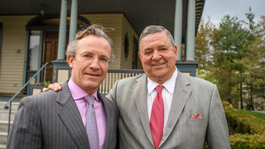 Clark University Trustee Robert Stevenish (right) and former trustee Robert Stevenish II