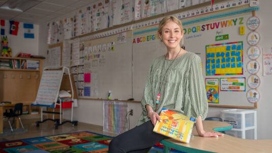 teacher holding bo