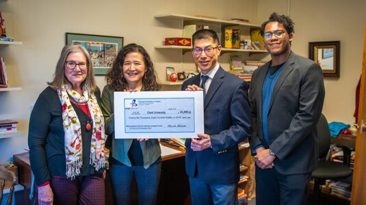 Shinichi Honda presents a check to Yuko Aoyama, associate provost and dean of research and graduate studies, Alice Valentine, professor of Japanese, and Kuy Howard, Japanese language instructor.