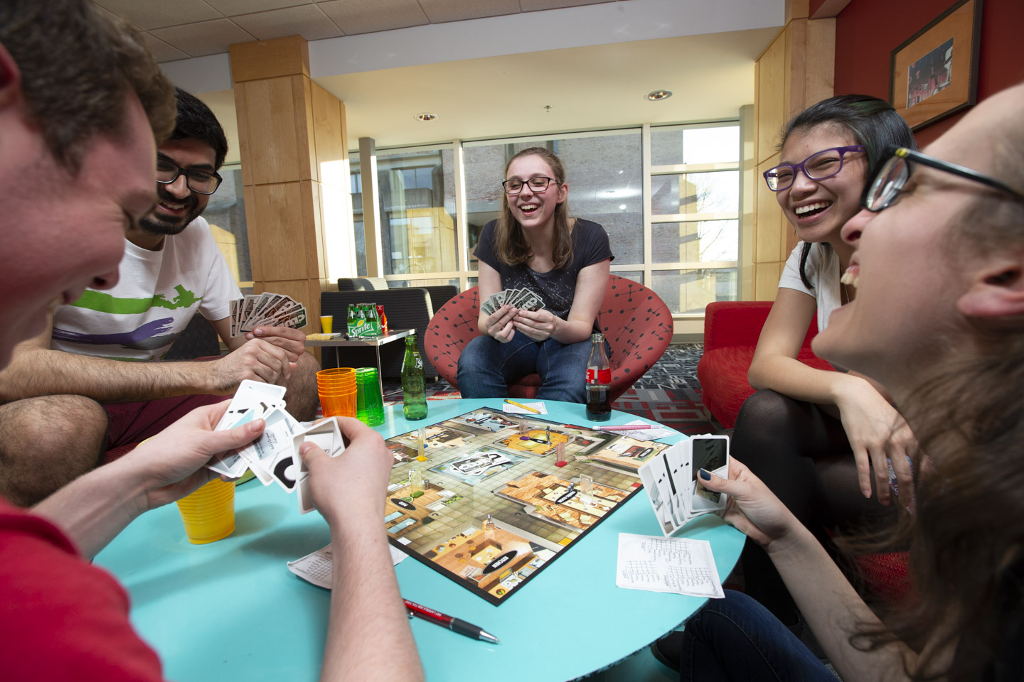 students playing board game