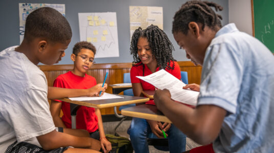 students at table