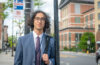 student on street outside courthouse