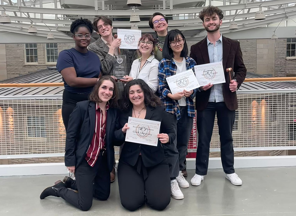 Model UN students pose for photo