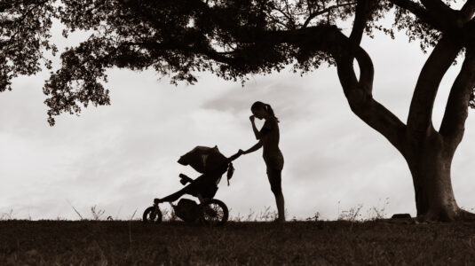 Mother pushing stroller