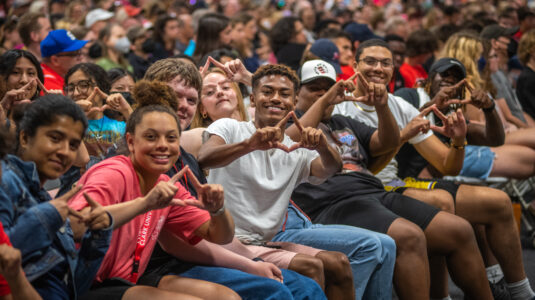 students pose for photo on move in day 2022