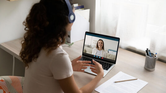 College student at online mental health appointment