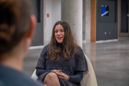 student in chair