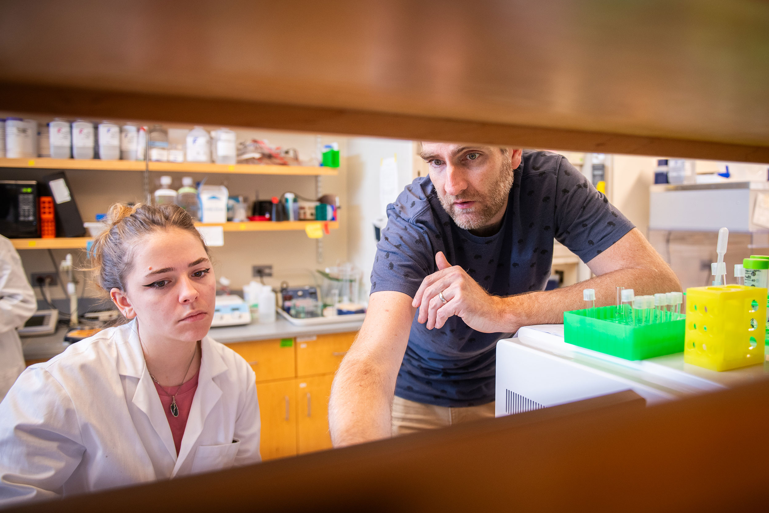 Faculty and student working in lab