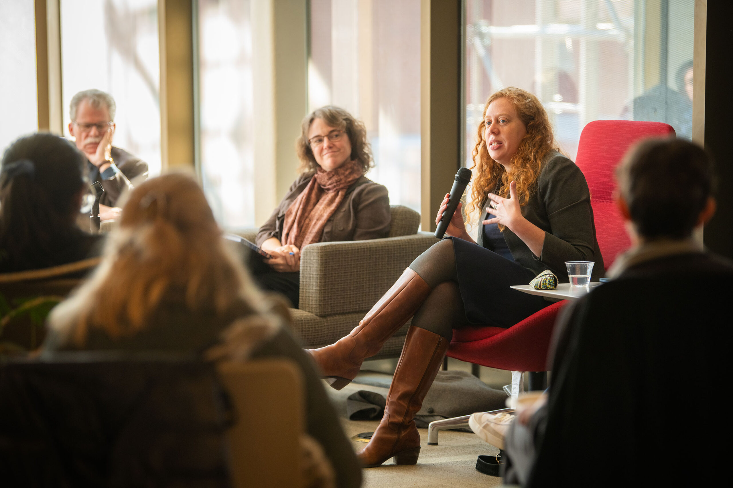 Ora Szekely speaking to audience at library