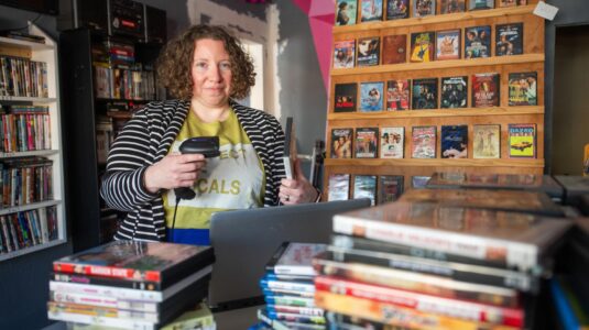 Professor Cara Berg Powers at Rewind video store.