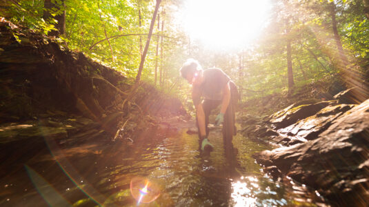 Clark University student Abby Beilman conducts water testing