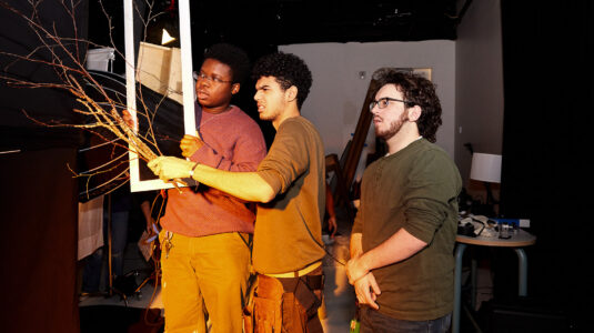 Tobi Pitan, Aidan Hilaire, and Zeke Fairley on the set of Moving Room