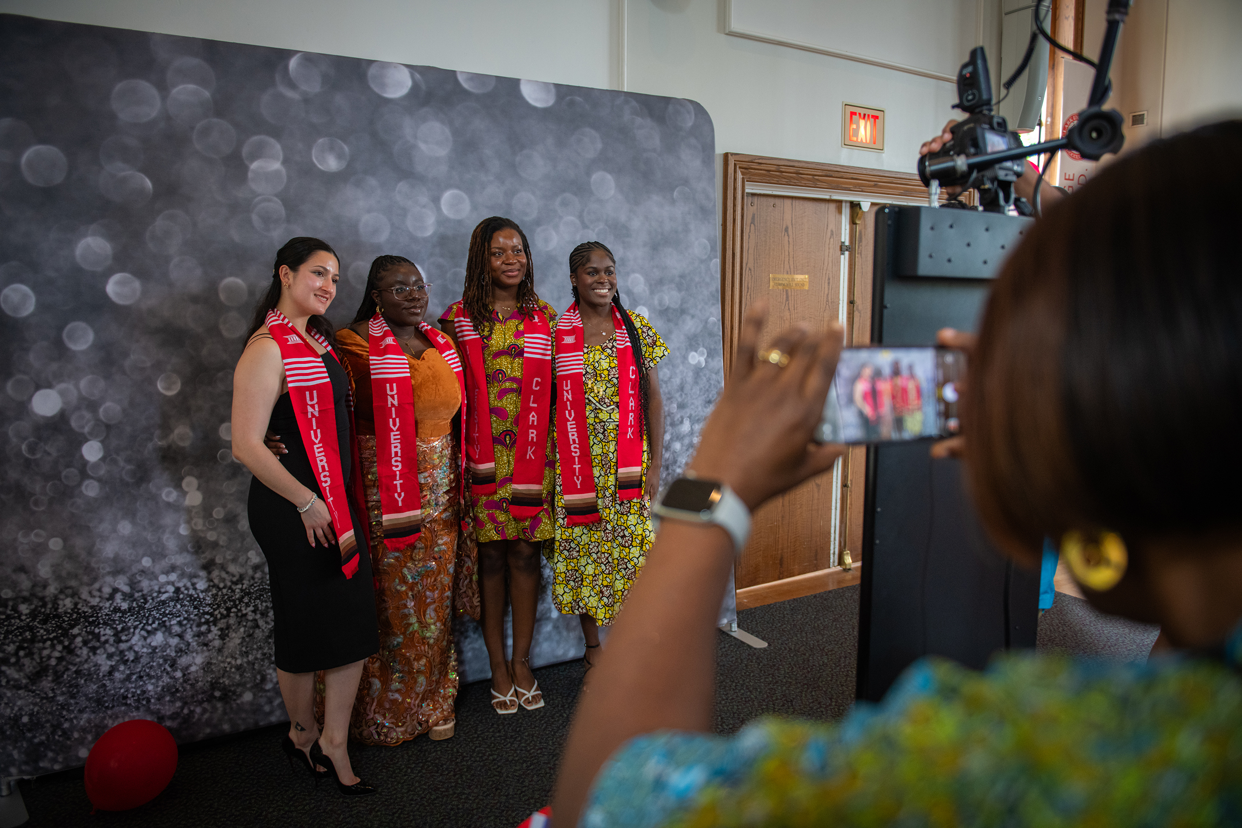 Four students pose for photo at Multicultural Student Graduation Celebration