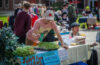 student at table at market