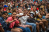 students posing for camera in crowd