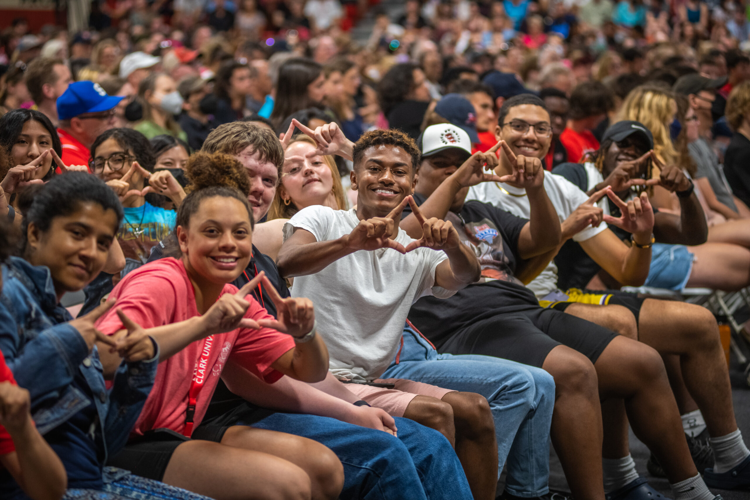 students posing for camera in crowd