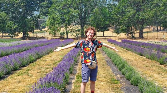 student in field of lavender