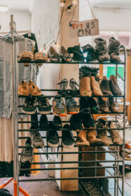 rack of shoes at thrift store