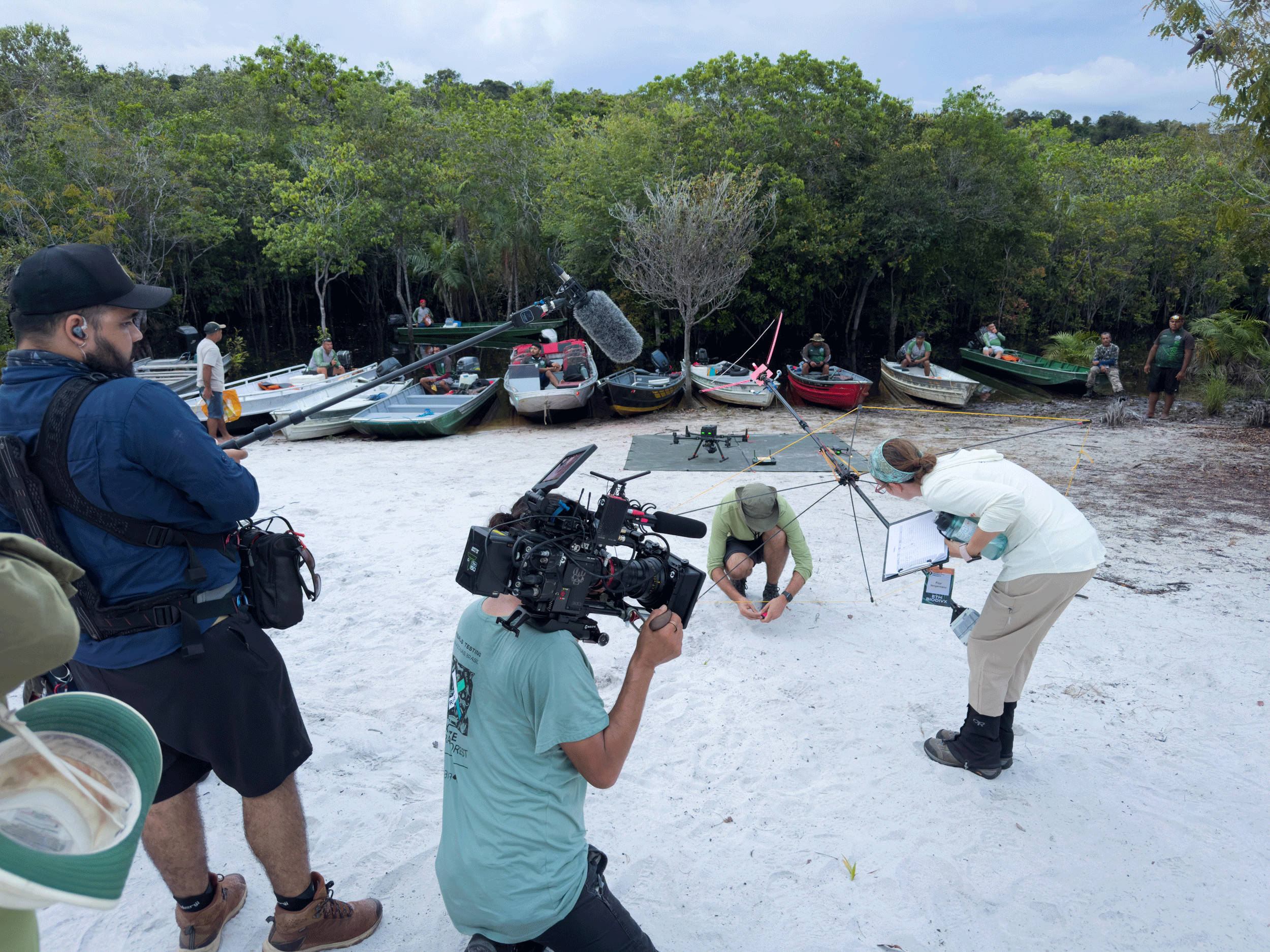 Beach with film crew