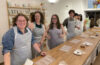 Students prepare to make chocolates in molds