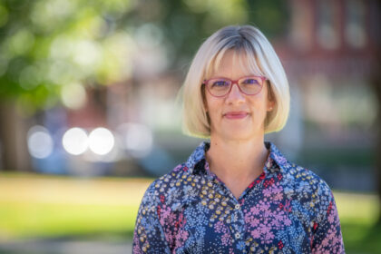 headshot of professor outside