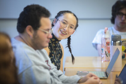 student smiling in class