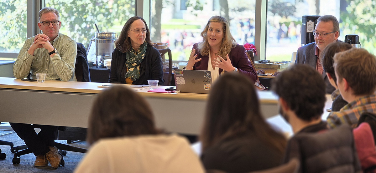 Dr. Kate Fickas, director of imagery and remote sensing solutions at Esri and the founder of Ladies of LandSAT, speaks at a career panel for Clark students. Also pictured are (from left) Charlie Frye, chief cartographer; Delphine Khanna, principal GIS content engineer; and Sean Breyer, director of Living Atlas of the World.