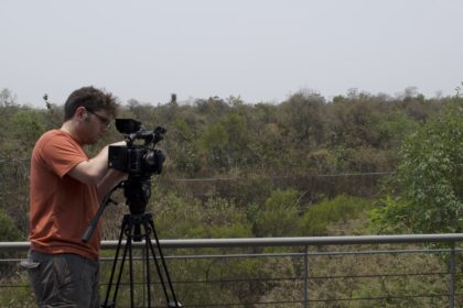 student with camera