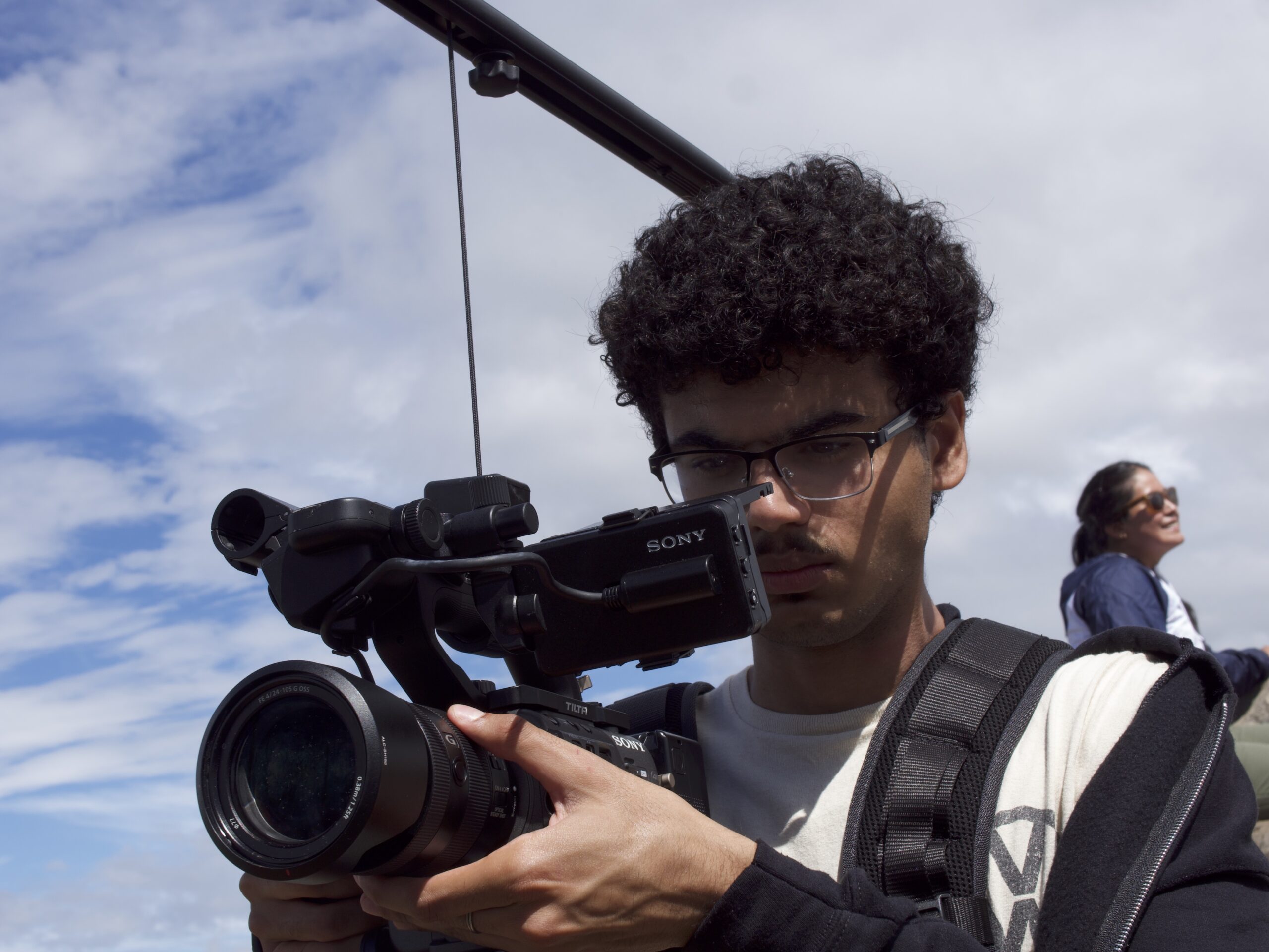 student with camera