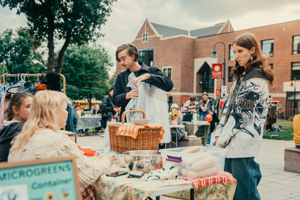 students shop at outdoor market