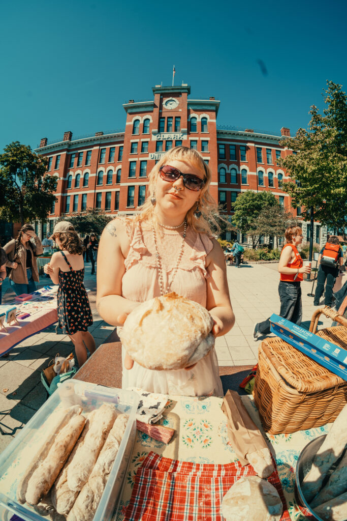 student holding bread