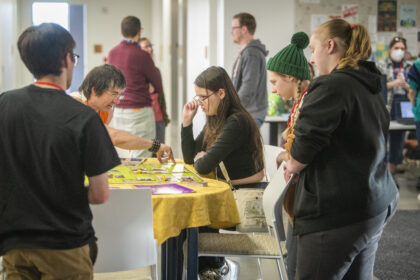 people look at video games during expo