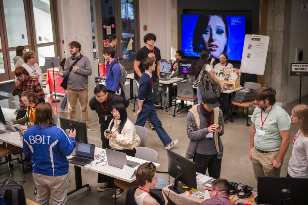 people look at video games during expo