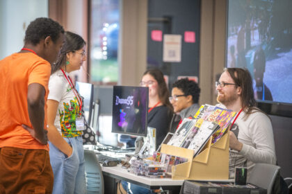 people look at video games during expo