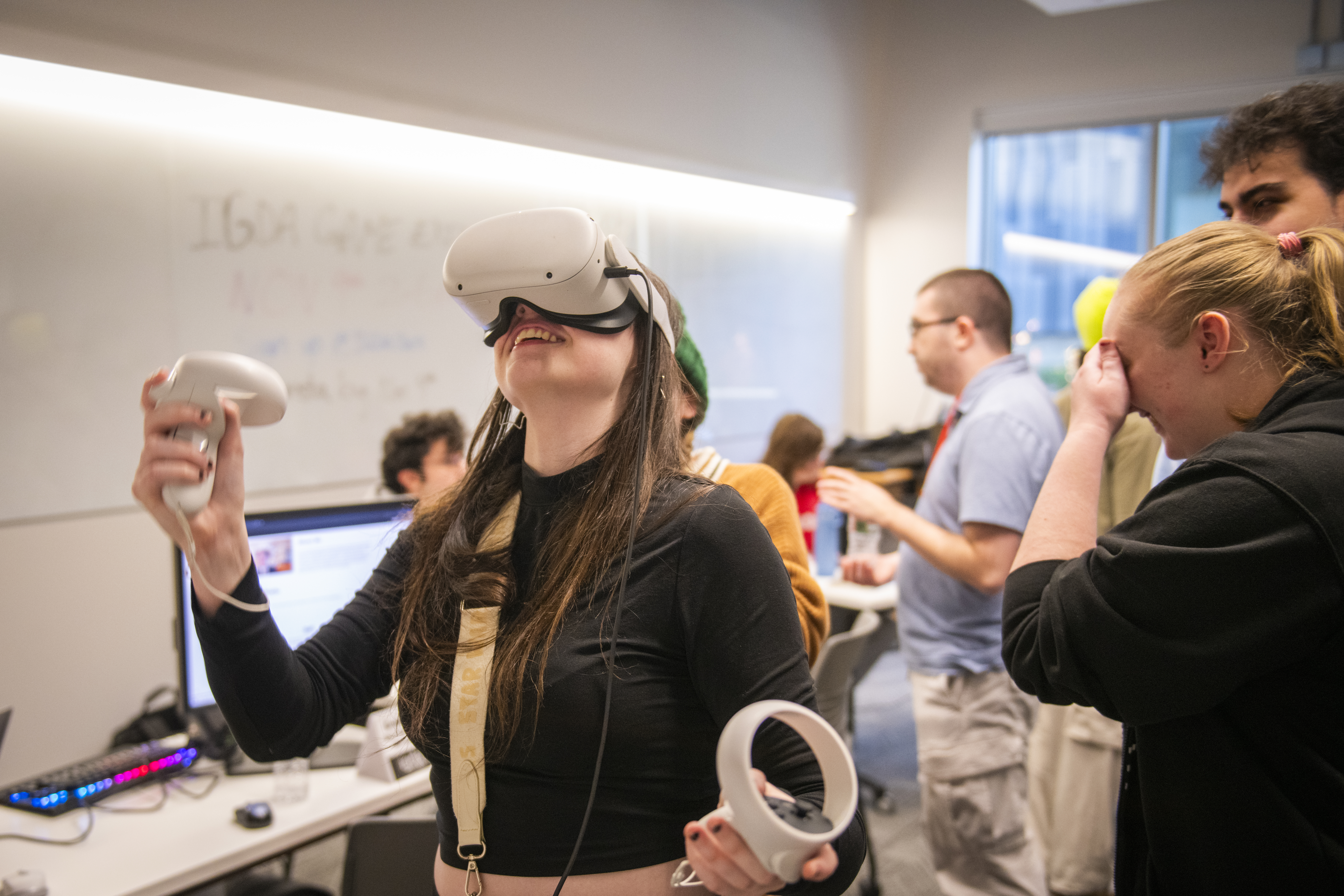 people look at video games during expo