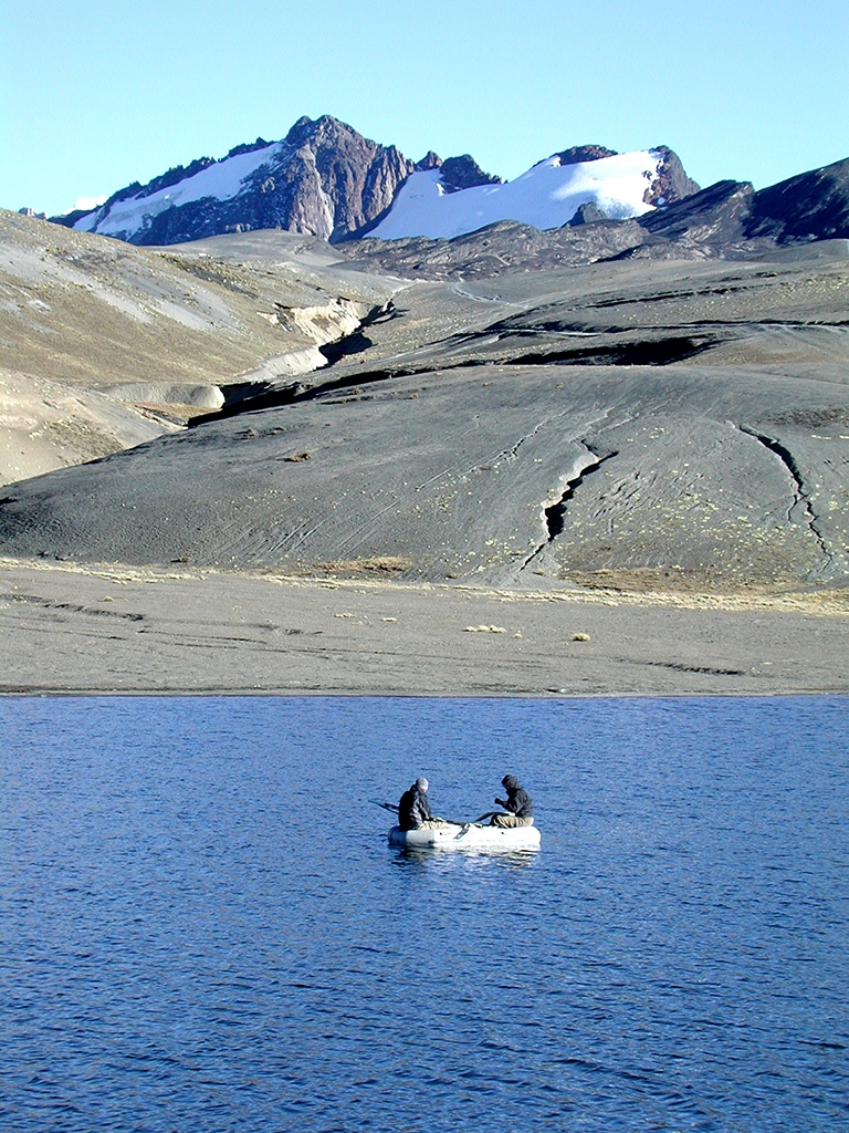 Jennifer Hanselman and colleague Will Gosling preparing to core the modern sediments at Laguna Estrellani, Bolivia, where elevation is more than 15,000 feet above sea level.