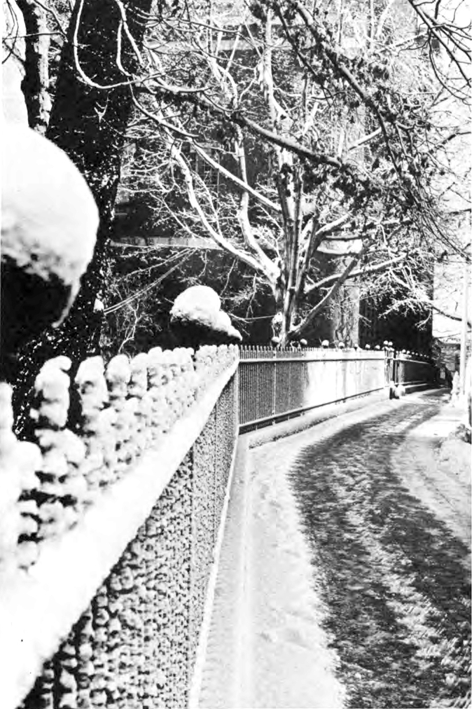 Clark University campus gate after snowfall, 1967