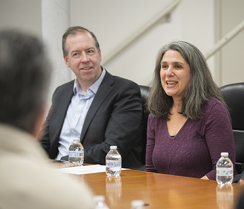 Interim Provost John Magee and Interim Dean of the College Laurie Ross attend the partnership signing ceremony at African Community Education