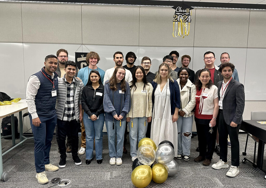 Faaiz Massood ’20 (front row, right) joins alumni, students, and faculty for a Clark Alumni Board of Computer Science event.