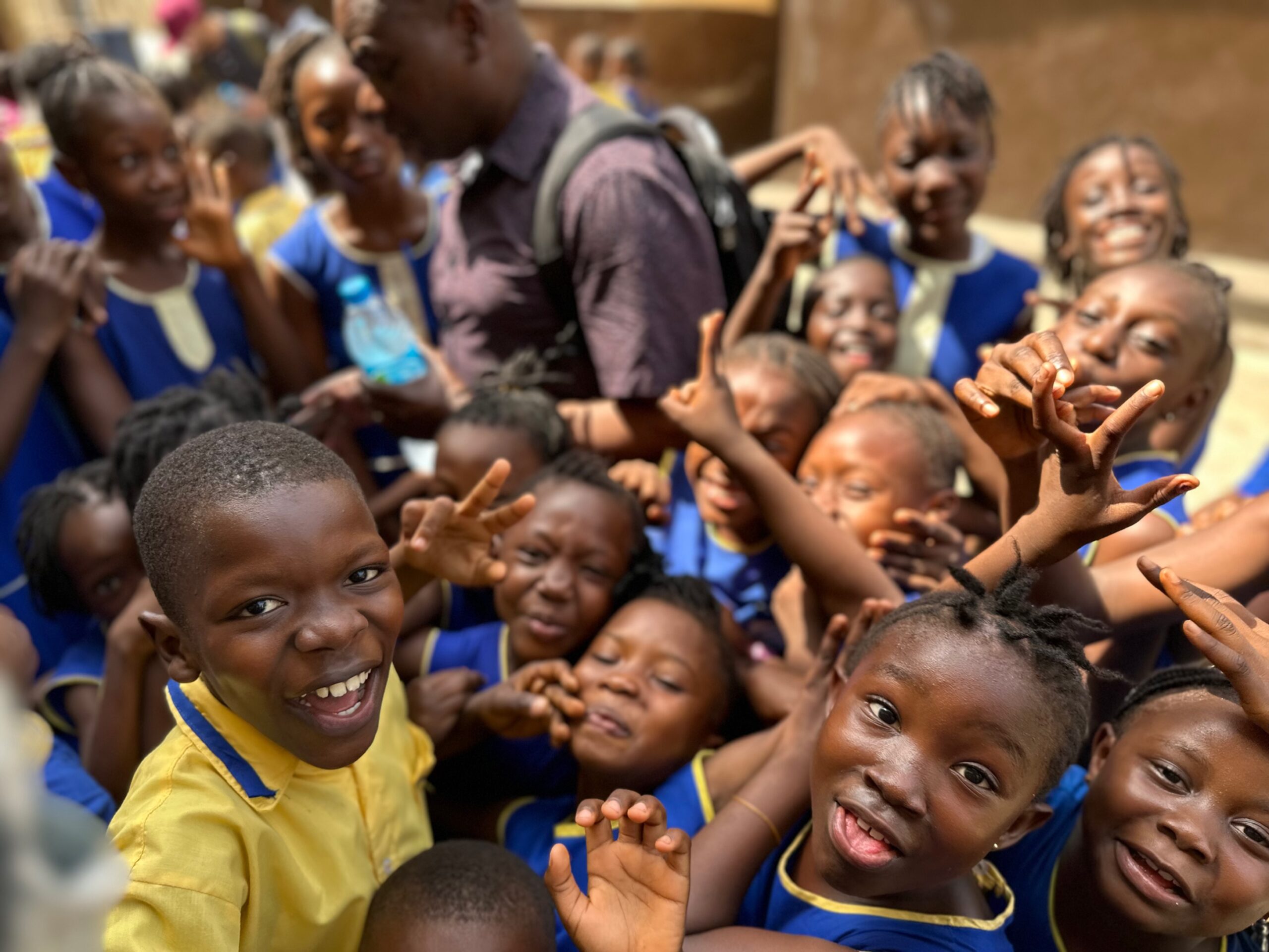 group of children pose for photo