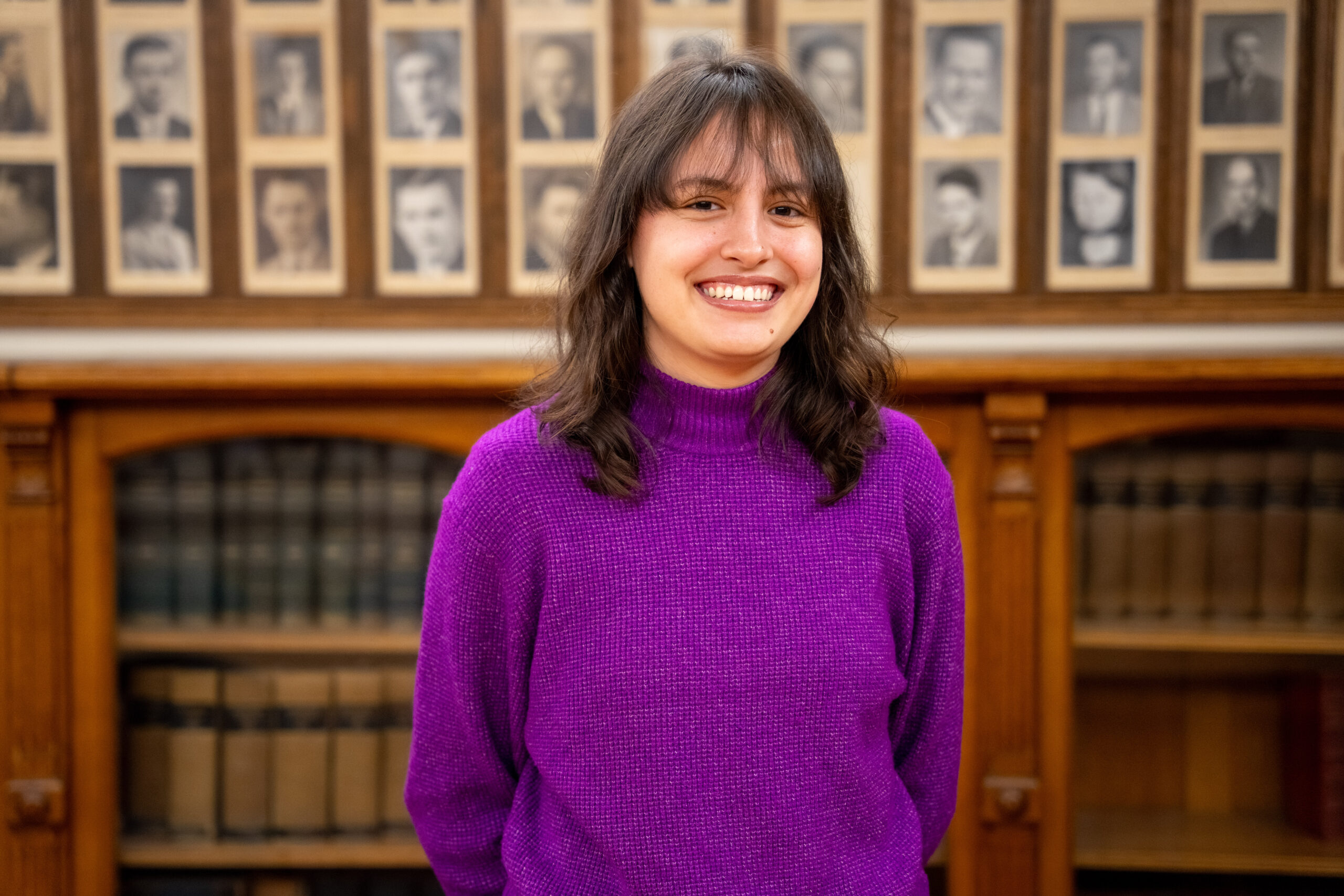 headshot of student wearing purple sweater