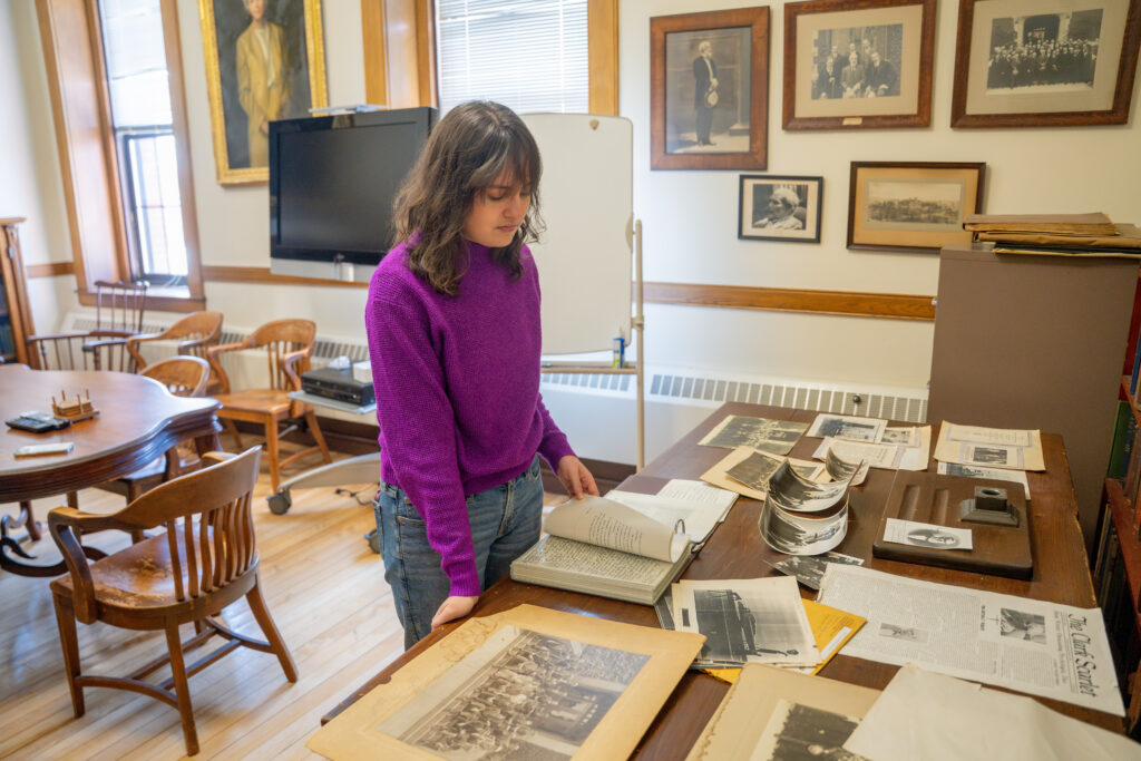 student looks at papers